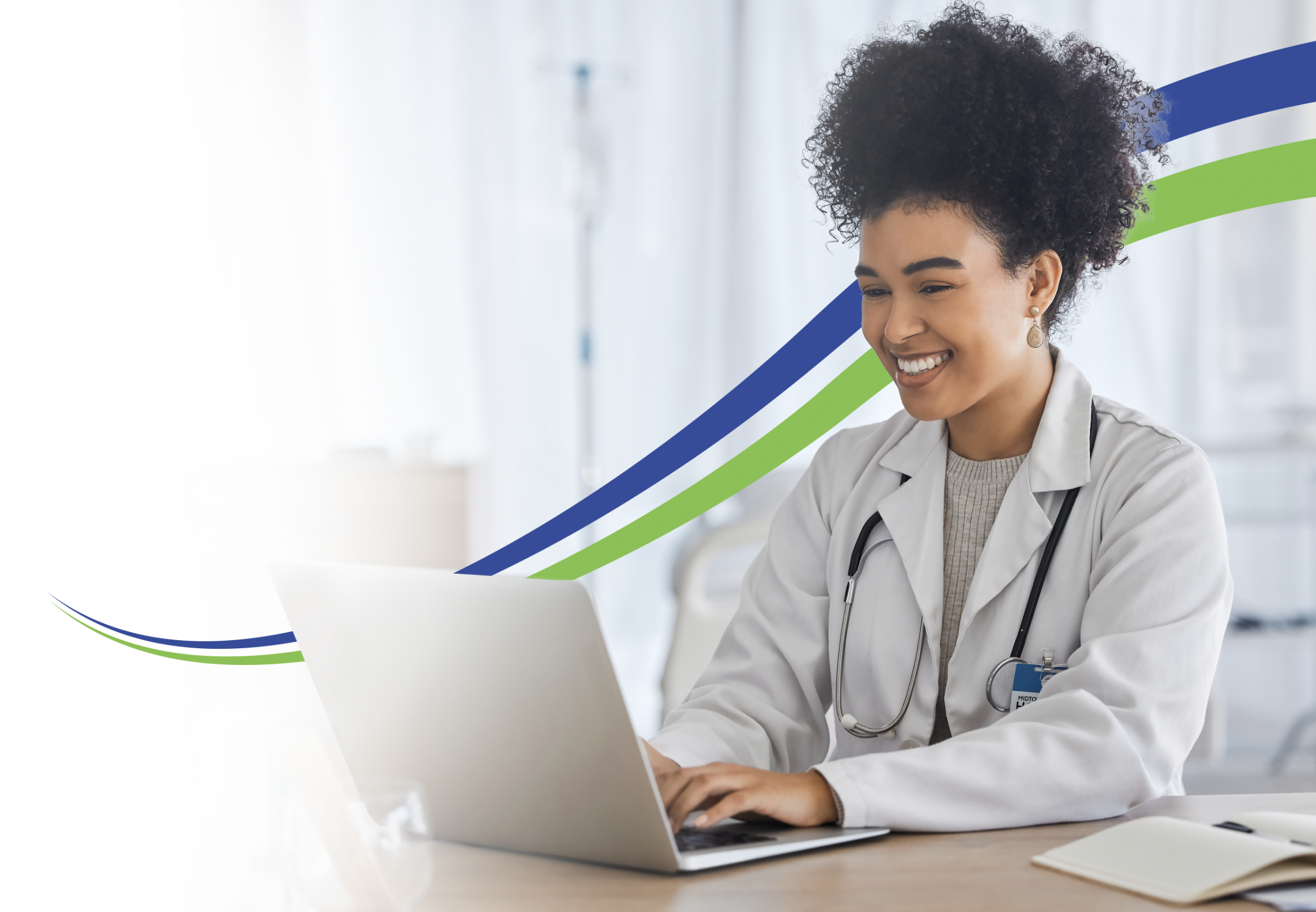 Image of a clinician using physician compensation technology
