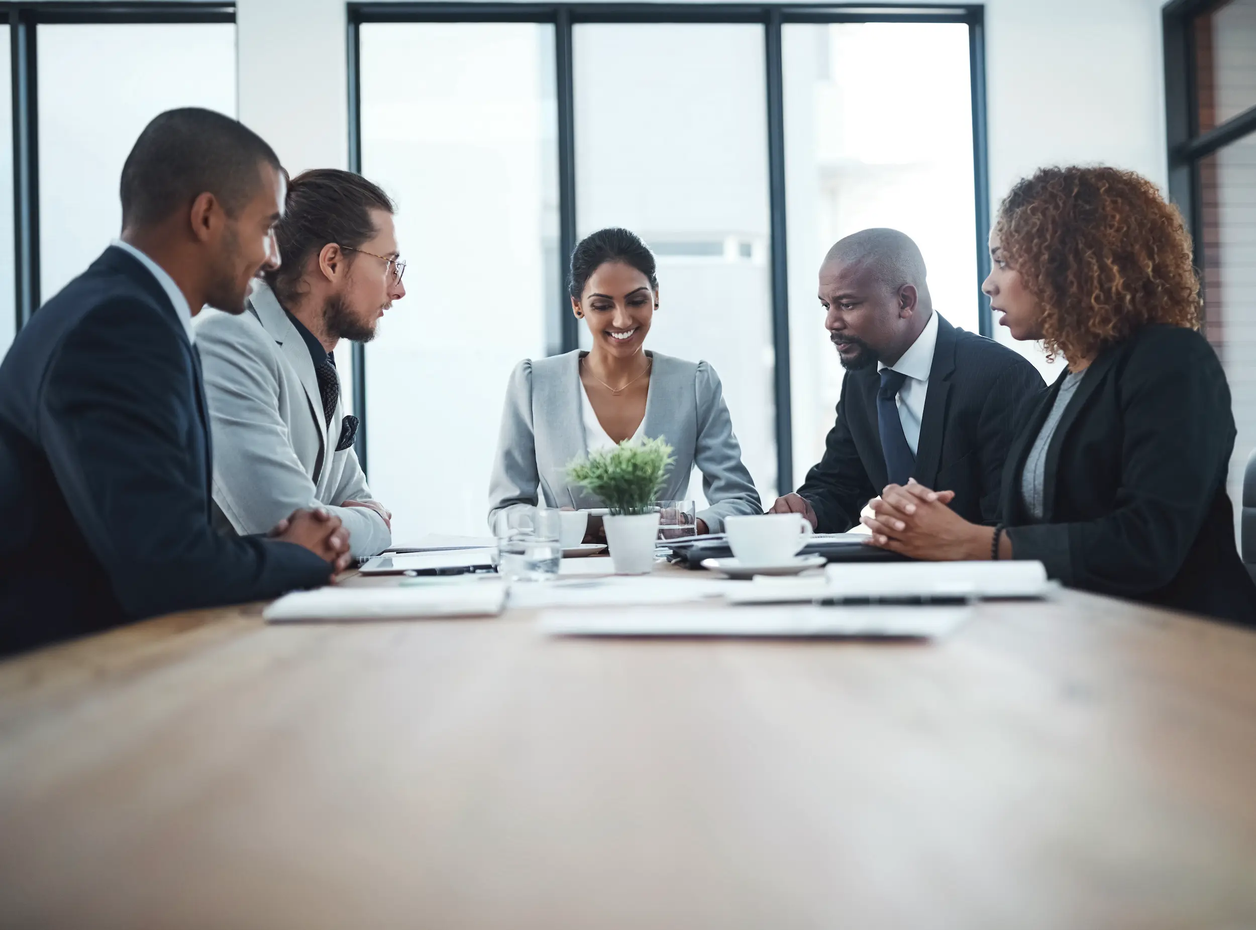 business professionals meeting at a table in offic 2026 01 09 10 56 25 utc